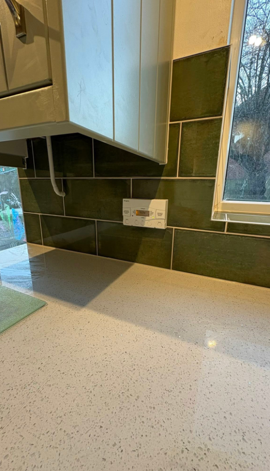 Green metro splashback & quartz 1
