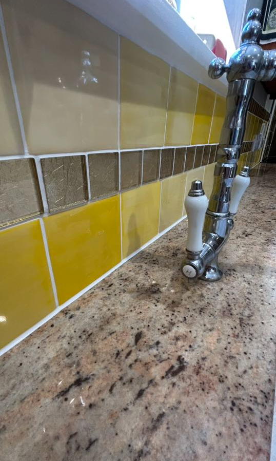 Yellow splashback & peacock mural tiling 1