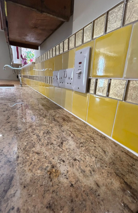 Yellow splashback & peacock mural tiling 2